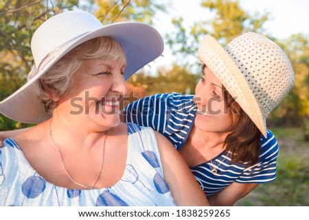 Similar – Senior woman in wheelchair laughing with her daughter