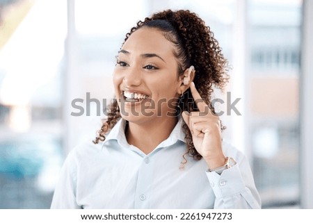 Happy, deaf and black woman with cochlear implant in office for communication, translation and speech on blurred background. Disability, hearing and female employee for sign language, hand or gesture
