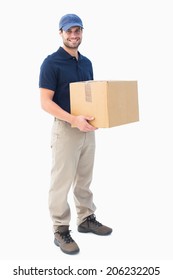 Happy delivery man holding cardboard box on white background
