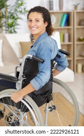 Happy Disabled Woman In Wheelchair