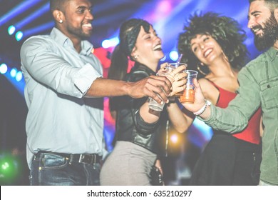 Happy Diverse Culture Friends Having Party In Club At Night - Young People Having Fun Cheering With Cocktails At Disco Dance Floor - Youth Concept - Focus On Black Man Hand - Vintage Filter