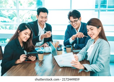 Happy Diverse Employees Team Celebrating Teamwork Success, Business Achievement At Meeting. Group Of Successful Happy Business People Working As A Team In Office On Meeting.