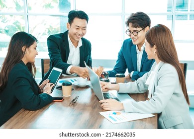 Happy Diverse Employees Team Celebrating Teamwork Success, Business Achievement At Meeting. Group Of Successful Happy Business People Working As A Team In Office On Meeting.