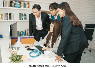 Happy Diverse Employees Team Celebrating Teamwork Success, Business Achievement At Meeting. Group Of Successful Happy Business People Working As A Team In Office On Meeting.