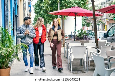 Happy Diverse Friends Walking On Street