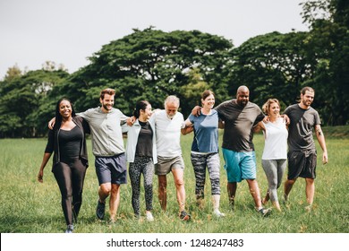 Happy Diverse People Enjoying Together In The Park