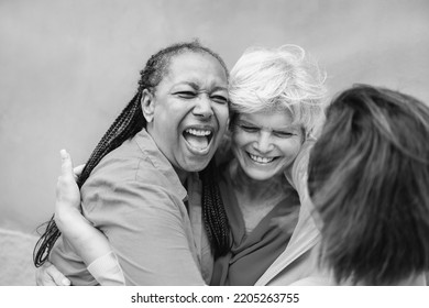 Happy Diverse Senior People Having Fun Greeting Each Other Outdoor - Older Friends Community Concept - Black And White Editing