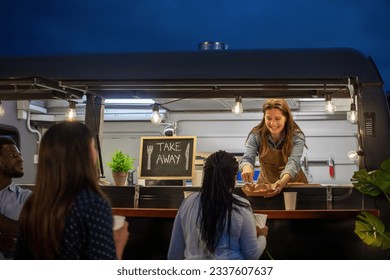 Happy diverse women working in cafe - Powered by Shutterstock