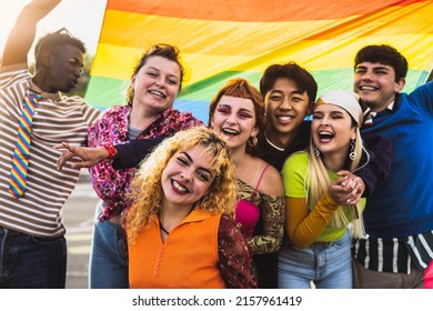 Happy diverse young friends celebrating gay pride festival - LGBTQ community concept  - Shutterstock ID 2157961419