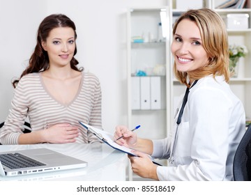 Happy Doctor With Her Patient - Young Beautiful Pregnant Woman