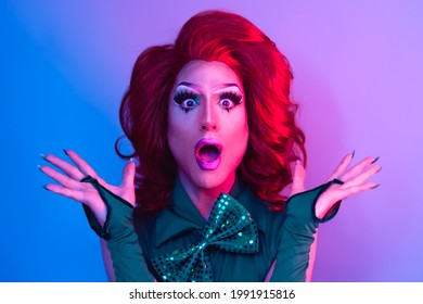 Happy drag queen having fun acting surprised in front of camera - LGBTQ concept 