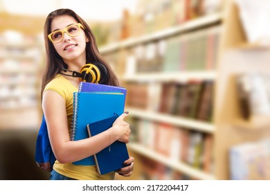 Happy Dreamy Confident Female College Student, Thinking Of Future Career Or University Graduation Exams In Library.