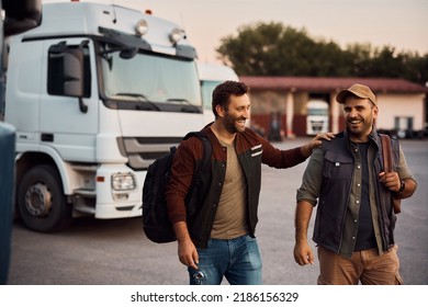 Happy Drivers Having Fun After Work On Truck Parking Lot. 