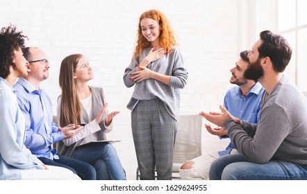 Happy Drug Addicted Woman Grateful For Group Support On Her Way To Recovery, Team Clapping Hands Celebrating Her Progress, Free Space