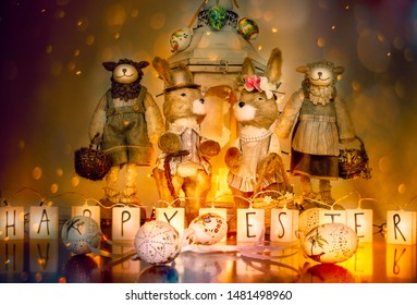 Happy easter. 4 bunnys with basckets full of eggs just to be hidden in a garten.Lantern behind and bolkeh as a background 