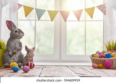 Happy Easter! Background With Colorful Eggs In Basket. Table Decorating For Holiday.