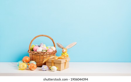 Happy Easter background. Congratulatory easter background. Easter colorful  eggs and gift.