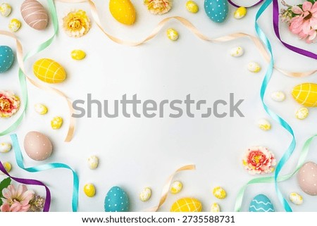 Happy Easter background with easter eggs, ribbons and spring flowers. Easter background with copy space. Flat lay. High quality photo with white background