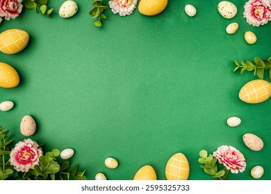 Happy Easter background with easter eggs and spring flowers. Easter background with copy space. Flat lay. High quality photo with green background