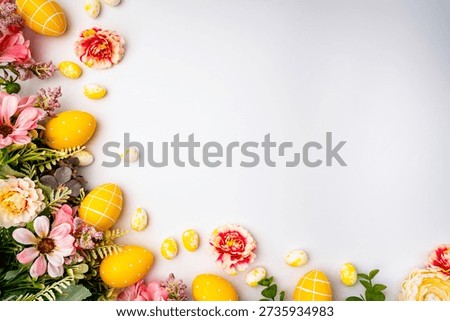 Happy Easter background with easter eggs and spring flowers. Easter background with copy space. Flat lay. High quality photo