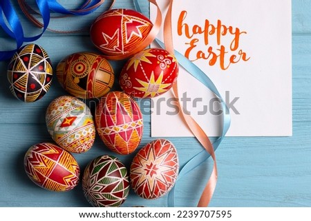 happy easter card. beautiful Easter egg Pysanka handmade  with the inscription happy easter