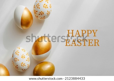 Happy Easter card. Easter golden eggs on on white background. Holiday concept.  
