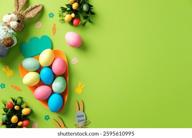 Happy Easter concept. Flat lay colorful Easter eggs in a carrot-shaped tray with festive decorations and bunny toy on a green background. - Powered by Shutterstock - Get 15% off with code: PIKWIZARD15