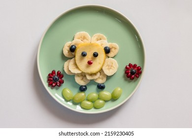 Happy Easter Concept On Plate, Sheep From Banana Fruit Full Of Vitamins On Plate, Isolated On White Backgrounds