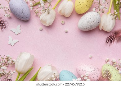 Happy Easter holiday greeting card. Bouquet of white tulips and Easter egg on pink background. Space for text