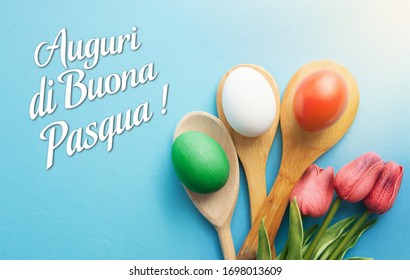 Happy Easter holiday Italian card, Easter eggs as the color of the Italy flag on blue - Shutterstock ID 1698013609