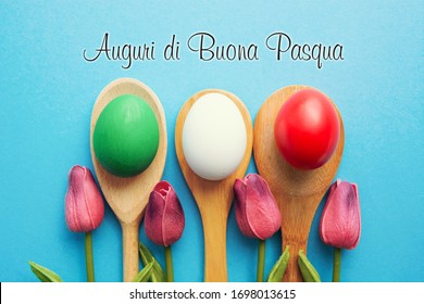 Happy Easter holiday Italian card, Easter eggs as the color of the Italy flag on blue - Shutterstock ID 1698013615