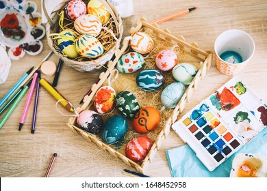 Happy Easter! Painting eggs  Paints  felt  tip pens  decorations for coloring eggs for holiday  Creative background  Family and kids preparing for Easter 