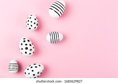 Happy Easter pattern. Frame made with beautiful hand painted eggs on bright pink background. Flat lay, top view.  - Powered by Shutterstock - Get 15% off with code: PIKWIZARD15