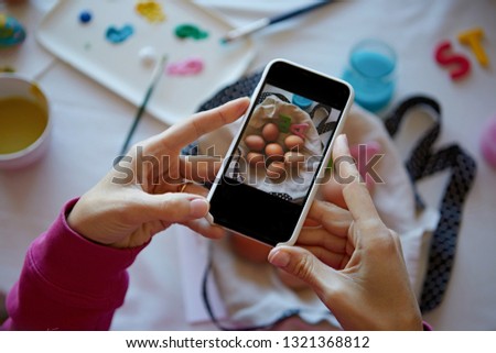 Similar – Image, Stock Photo Young hands taking photos with smartphones to vegetable skewers