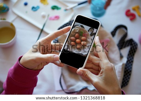 Similar – Image, Stock Photo Young hands taking photos with smartphones to vegetable skewers