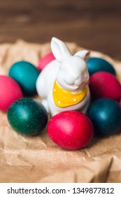 Happy Easter rustic wooden background. . Spring holiday concept, place for text. Flat lay . Rabbit and Eggs