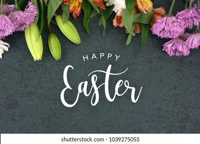 Happy Easter Text With Beautiful Colorful Flowers Bouquet Border Shot From Directly Above Over Black Dark Texture Background, Horizontal