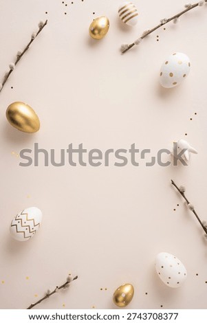 Happy Easter vertical greeting composition featuring gold and white decorated eggs, a small bunny figurine, pussy willow branches and scattered gold confetti on a soft pastel background