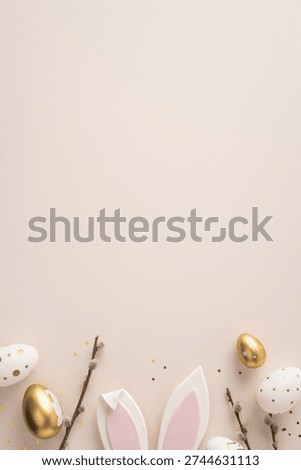 Happy Easter vertical greeting composition featuring bunny ears, decorated egg, gold accents and pussywillow branch on soft pink background conveying spring celebration and warm wishes