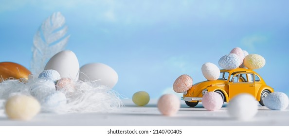 Happy Easter.Easter Poster With Colorful Easter Sweet Eggs And Yellow Car.Spring Easter Holiday Banner With Copy Space-Minsk,Belarus-marsh 2022