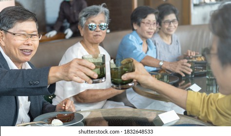 Happy Elderly Family Senior People Society Lifestyle Concept. Ageing Asia Women Having Dinner On Dining Table Together In Hospice Older Wellbeing Nursing Home Community.