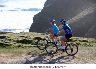 Happy Elderly Senior Couple Cycling 