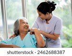 Happy elderly woman patient feel satisfied with nurse and good quality service in hospital.