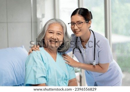 Happy elderly woman patient feel satisfied with nurse and good quality service in hospital.
