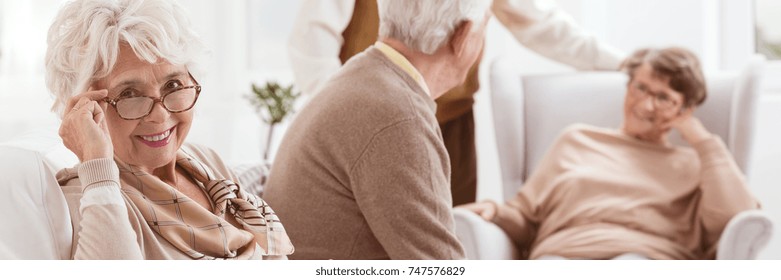 Happy And Elegant Senior Lady In Retirement Home