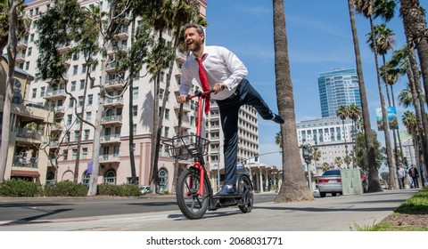 Happy Employer In Formalwear Have Fun Riding Escooter On Sidewalk, Recreation