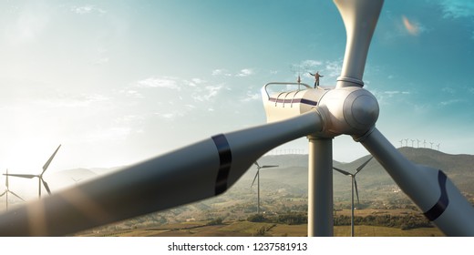 Happy engineer feel success after good work. He standing a top of windmill and looking beautiful sunset landscape - Shutterstock ID 1237581913