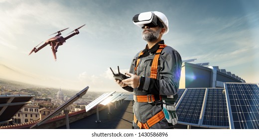 Happy Engineer Using Drone And Vr Helmet For Cheking Solar Station In Roof