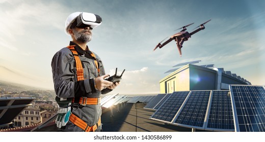 Happy Engineer Using Drone And Vr Helmet For Cheking Solar Station In Roof