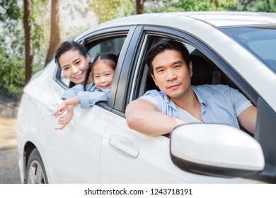 Happy Enjoy Asian Family In Car Driving To Travel In Weekend